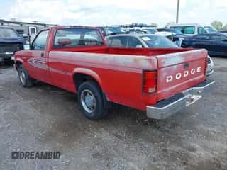 1992 Dodge Dakota S z VIN 1B7FL26X3NS677489, wystawiony jako IAAI lot #42167931 z przebiegiem 108 582 mil mil oraz . Historia ofert i sprzedaży dostępna na DreamBid. Obrazek 3.