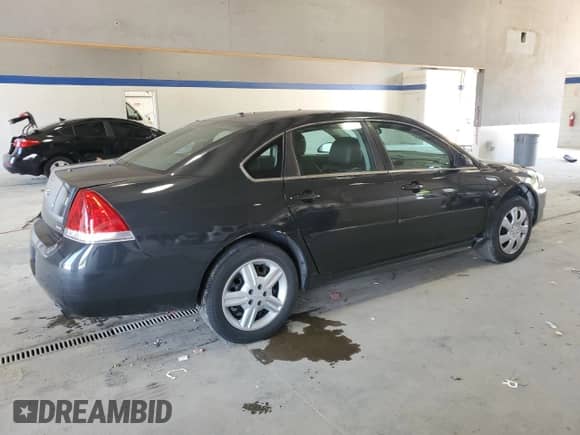 2015 Chevrolet Impala Police Police z VIN 2G1WD5E36F1157424, wystawiony jako Copart lot #62017755 z przebiegiem 185 746 mil mil oraz Szkoda całkowita • Salvage title. Historia ofert i sprzedaży dostępna na DreamBid. Obrazek 3.