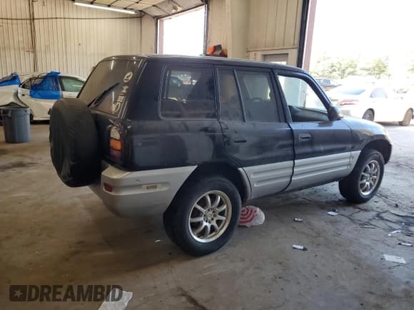✅ 2000 Toyota RAV4 • VIN: JT3HP10V4Y0232794 • Lot: 84278185. Listed on Copart with 243,884 mi. Free auction sales archive from the USA and detailed vehicle history report at DreamBid. Image 3.