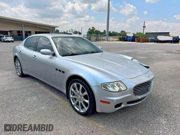 ✅ 2006 Maserati Quattroporte • VIN: ZAMCE39A360022008 • Lot: 93559295. Wystawiony na Copart z przebiegiem 89 225 mil. Bezpłatny archiwum sprzedaży aukcyjnych z USA i szczegółowy raport historii pojazdu na DreamBid. Zdjęcie 1.