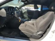 ✅ 2014 Dodge Challenger SXT • VIN: 2C3CDYAG6EH233836 • Lot: 75433204. Wystawiony na Copart z przebiegiem 160 761 mil. Bezpłatny archiwum sprzedaży aukcyjnych z USA i szczegółowy raport historii pojazdu na DreamBid. Zdjęcie 7.