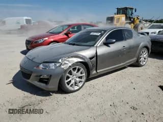 ✅ 2009 Mazda RX-8 Grand Touring • VIN: JM1FE17P190401476 • Lot: 68017245. Listed on Copart with 91,795 mi. Free auction sales archive from the USA and detailed vehicle history report at DreamBid. Image 1.