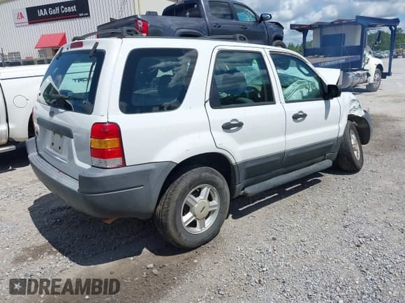 ✅ 2004 Ford Escape XLS • VIN: 1FMYU021X4DA22109 • Lot: 42710754. Listed on IAAI with Not provided. Free auction sales archive from the USA and detailed vehicle history report at DreamBid. Image 4.