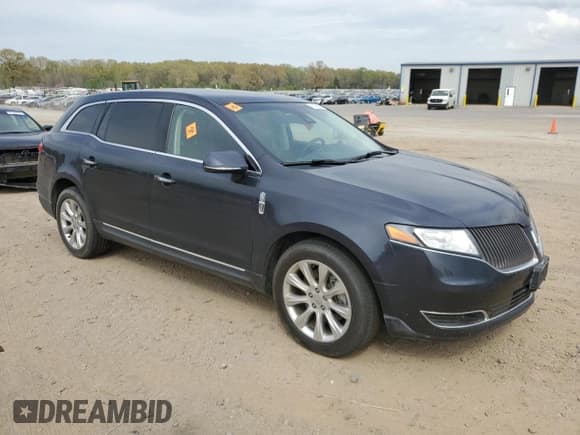 ✅ 2014 Lincoln MKT • VIN: 2LMHJ5FK2EBL57627 • Lot: 51113825. Listed on Copart with 79,466 mi. Free auction sales archive from the USA and detailed vehicle history report at DreamBid. Image 4.