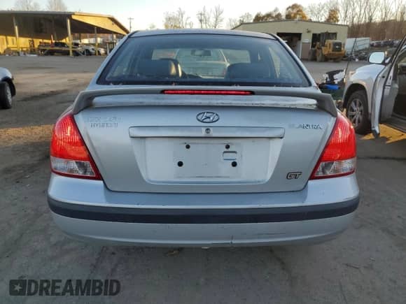2003 Hyundai Elantra GLS z VIN KMHDN45D73U633397, wystawiony jako Copart lot #79562704 z przebiegiem 127 366 mil mil oraz Czysty tytuł • Clean title. Historia ofert i sprzedaży dostępna na DreamBid. Obrazek 6.