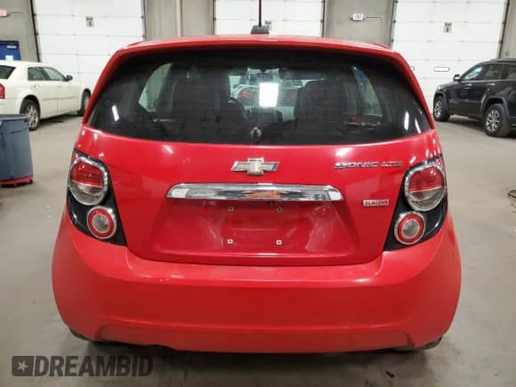 ✅ 2015 Chevrolet Sonic LTZ • VIN: 1G1JE6SB6F4199279 • Lot: 86112665. Listed on Copart with 158,443 mi. Free auction sales archive from the USA and detailed vehicle history report at DreamBid. Image 6.