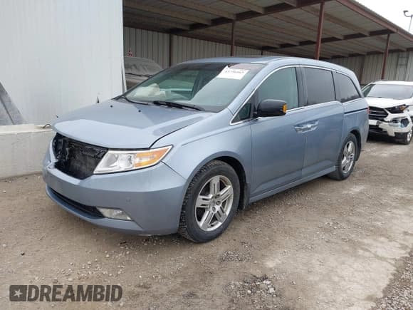 ✅ 2011 Honda Odyssey Touring • VIN: 5FNRL5H90BB060864 • Lot: 43756563. Listed on IAAI with 183,992 mi. Free auction sales archive from the USA and detailed vehicle history report at DreamBid. Image 2.