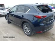 ✅ 2021 Mazda CX-5 Grand Touring Reserve • VIN: JM3KFBAY5M0425671 • Lot: 42341700. Listed on IAAI with 44,450 mi. Free auction sales archive from the USA and detailed vehicle history report at DreamBid. Image 3.