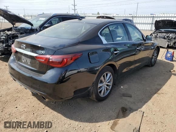 ✅ 2021 Infiniti Q50 Pure • VIN: JN1EV7AR0MM751906 • Лот: 71446174. Опубликован ранее на Copart с пробегом 26 239 миль. Бесплатный доступ к архиву аукционных продаж из США и подробный отчёт об истории автомобиля на DreamBid. Изображение 3.