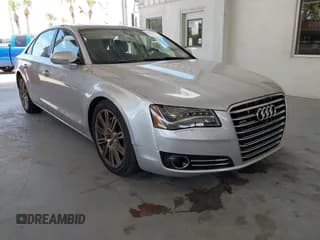✅ 2014 Audi A8 3.0T • VIN: WAURGAFDXEN008763 • Lot: 42995214. Listed on IAAI with 91,825 mi. Free auction sales archive from the USA and detailed vehicle history report at DreamBid. Image 1.