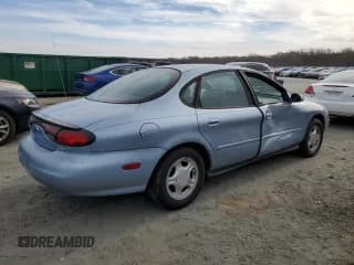 ✅ 1998 Ford Taurus LX • VIN: 1FAFP52U2WG248212 • Lot: 82638364. Listed on Copart with 191,643 mi. Free auction sales archive from the USA and detailed vehicle history report at DreamBid. Image 3.
