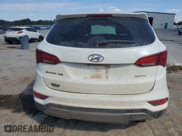 ✅ 2017 Hyundai Santa Fe 2.4L • VIN: 5NMZT3LB3HH009378 • Лот: 81868275. Опубликован ранее на Copart с пробегом Не указан. Бесплатный доступ к архиву аукционных продаж из США и подробный отчёт об истории автомобиля на DreamBid. Изображение 6.