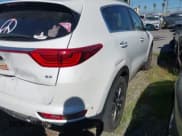 ✅ 2019 Kia Sportage EX • VIN: KNDPN3AC8K7567271 • Lot: 43323376. Listed on IAAI with 96,268 mi. Free auction sales archive from the USA and detailed vehicle history report at DreamBid. Image 4.