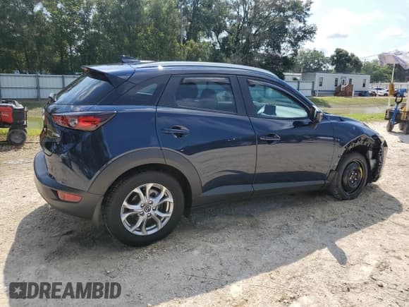 ✅ 2021 Mazda CX-3 Sport • VIN: JM1DKFB78M1516986 • Лот: 70729665. Опубликован ранее на Copart с пробегом 52 603 миль. Бесплатный доступ к архиву аукционных продаж из США и подробный отчёт об истории автомобиля на DreamBid. Изображение 3.