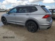 ✅ 2023 Volkswagen Tiguan SE R-Line Black • VIN: 3VVCB7AX4PM054406 • Лот: 89832915. Опубликован ранее на Copart с пробегом Не указан. Бесплатный доступ к архиву аукционных продаж из США и подробный отчёт об истории автомобиля на DreamBid. Изображение 2.