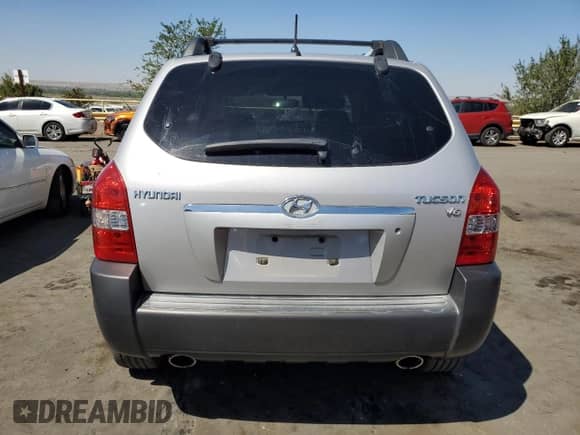 2006 Hyundai Tucson GLS z VIN KM8JN12D16U439636, wystawiony jako Copart lot #71318684 z przebiegiem 140 225 mil mil oraz Szkoda całkowita • Salvage title. Historia ofert i sprzedaży dostępna na DreamBid. Obrazek 6.