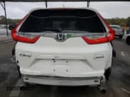 ✅ 2018 Honda CR-V EX-L • VIN: 2HKRW2H87JH648225 • Лот: 90021185. Опубликован ранее на Copart с пробегом 65 252 миль. Бесплатный доступ к архиву аукционных продаж из США и подробный отчёт об истории автомобиля на DreamBid. Изображение 6.