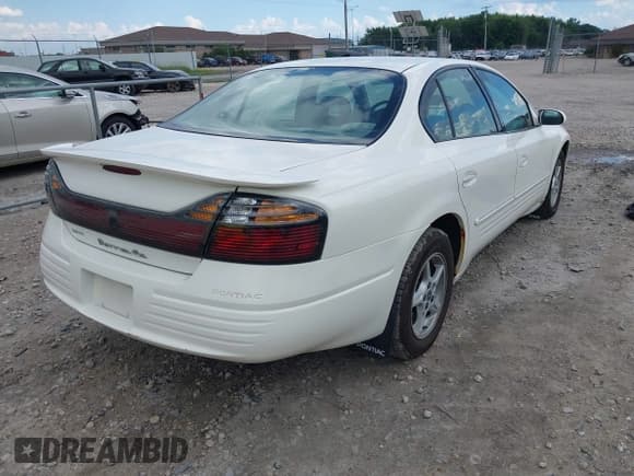 ✅ 2002 Pontiac Bonneville SE • VIN: 1G2HX54K424213640 • Lot: 42632915. Wystawiony na IAAI z przebiegiem 82 248 mil. Bezpłatny archiwum sprzedaży aukcyjnych z USA i szczegółowy raport historii pojazdu na DreamBid. Zdjęcie 4.