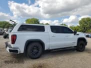 ✅ 2023 GMC Sierra 1500 AT4X • VIN: 3GTUUFELXPG131132 • Лот: 69287445. Опубликован ранее на Copart с пробегом 87 210 миль. Бесплатный доступ к архиву аукционных продаж из США и подробный отчёт об истории автомобиля на DreamBid. Изображение 3.