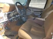 ✅ 1985 Jeep CJ • VIN: 1JCCF87E2FT063294 • Lot: 83882604. Listed on Copart with 10,428 mi. Free auction sales archive from the USA and detailed vehicle history report at DreamBid. Image 7.