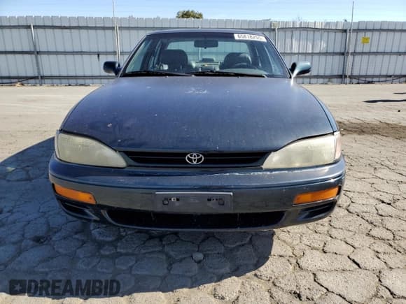 ✅ 1995 Toyota Camry LE • VIN: JT2GK12E3S0117364 • Lot: 65818255. Wystawiony na Copart z przebiegiem 215 464 mil. Bezpłatny archiwum sprzedaży aukcyjnych z USA i szczegółowy raport historii pojazdu na DreamBid. Zdjęcie 5.
