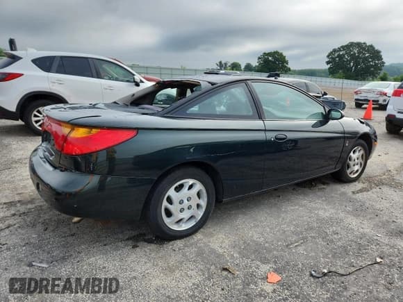 ✅ 2001 Saturn SC • VIN: 1G8ZP12881Z226032 • Лот: 62209055. Опубликован ранее на Copart с пробегом 81 459 миль. Бесплатный доступ к архиву аукционных продаж из США и подробный отчёт об истории автомобиля на DreamBid. Изображение 3.