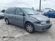 ✅ 2002 Honda Odyssey EX-L • VIN: 5FNRL18042B028283 • Lot: 41653033. Wystawiony na IAAI z przebiegiem 253 191 mil. Bezpłatny archiwum sprzedaży aukcyjnych z USA i szczegółowy raport historii pojazdu na DreamBid. Zdjęcie 1.