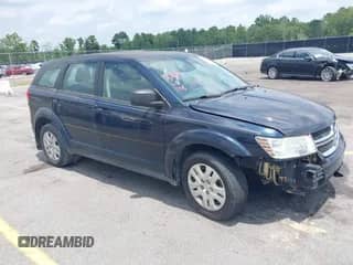 2015 Dodge Journey American Value z VIN 3C4PDCAB8FT727953, wystawiony jako IAAI lot #42700601 z przebiegiem 124 145 mil mil oraz . Historia ofert i sprzedaży dostępna na DreamBid. Obrazek 1.