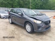 ✅ 2014 Mazda CX-5 Sport • VIN: JM3KE2BE5E0350057 • Lot: 42145910. Listed on IAAI with 157,517 mi. Free auction sales archive from the USA and detailed vehicle history report at DreamBid. Image 1.