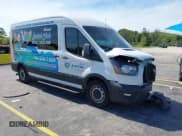 ✅ 2021 Ford Transit Passenger XL • VIN: 1FBAX2C80MKA71307 • Lot: 42790699. Listed on IAAI with 67,943 mi. Free auction sales archive from the USA and detailed vehicle history report at DreamBid. Image 1.