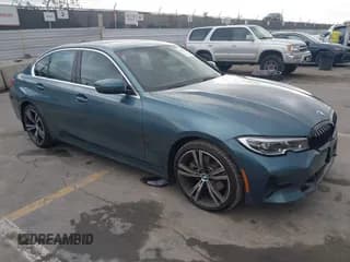 ✅ 2021 BMW 3 Series 330i • VIN: 3MW5R1J06M8B58481 • Lot: 43752256. Listed on IAAI with 15,446 mi. Free auction sales archive from the USA and detailed vehicle history report at DreamBid. Image 1.