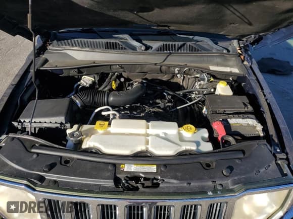 ✅ 2012 Jeep Liberty Sport Latitude • VIN: 1C4PJLAKXCW179646 • Lot: 81241625. Listed on Copart with 115,850 mi. Free auction sales archive from the USA and detailed vehicle history report at DreamBid. Image 12.