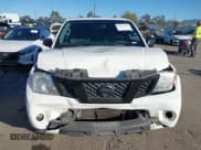 ✅ 2020 Nissan Frontier SV • VIN: 1N6ED0EA9LN728299 • Lot: 43657712. Listed on IAAI with 127,885 mi. Free auction sales archive from the USA and detailed vehicle history report at DreamBid. Image 12.