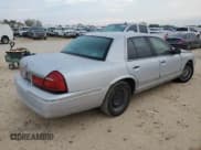 ✅ 2000 Mercury Grand Marquis GS • VIN: 2MEFM74W7YX720199 • Lot: 86310775. Wystawiony na Copart z przebiegiem 113 451 mil. Bezpłatny archiwum sprzedaży aukcyjnych z USA i szczegółowy raport historii pojazdu na DreamBid. Zdjęcie 3.