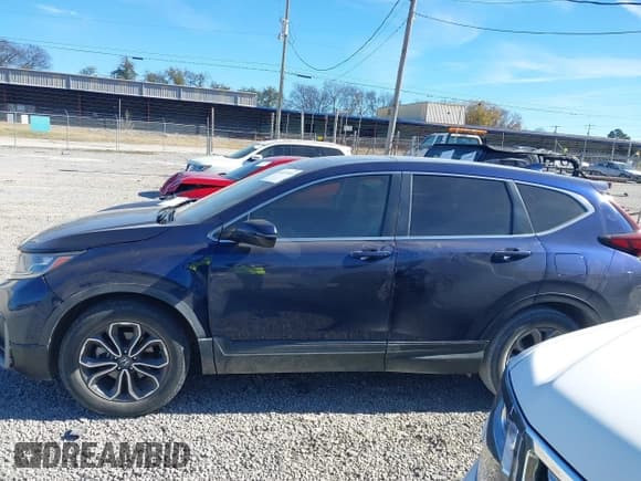 ✅ 2020 Honda CR-V EX-L • VIN: 2HKRW1H8XLH415825 • Lot: 43697303. Listed on IAAI with 128,863 mi. Free auction sales archive from the USA and detailed vehicle history report at DreamBid. Image 15.