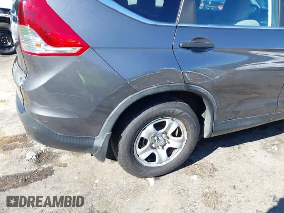 ✅ 2013 Honda CR-V LX • VIN: 3CZRM3H39DG710070 • Lot: 43602535. Listed on IAAI with 105,591 mi. Free auction sales archive from the USA and detailed vehicle history report at DreamBid. Image 17.