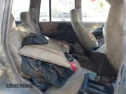 ✅ 1995 Jeep Grand Cherokee Laredo • VIN: 1J4GZ58S9SC569349 • Lot: 43305892. Listed on IAAI with 209,279 mi. Free auction sales archive from the USA and detailed vehicle history report at DreamBid. Image 8.