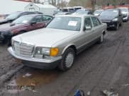 ✅ 1987 Mercedes-Benz 560 • VIN: WDBCA39D5HA357048 • Lot: 41672343. Listed on IAAI with 151,635 mi. Free auction sales archive from the USA and detailed vehicle history report at DreamBid. Image 2.