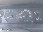 ✅ 1999 Jeep Grand Cherokee Laredo • VIN: 1J4GW58S1XC520727 • Lot: 43730318. Wystawiony na IAAI z przebiegiem 154 356 mil. Bezpłatny archiwum sprzedaży aukcyjnych z USA i szczegółowy raport historii pojazdu na DreamBid. Zdjęcie 15.