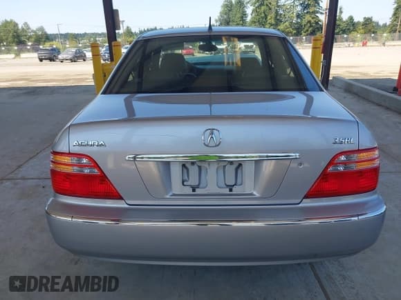 ✅ 2002 Acura RL • VIN: JH4KA965X2C012623 • Lot: 42819663. Listed on IAAI with 121,004 mi. Free auction sales archive from the USA and detailed vehicle history report at DreamBid. Image 16.
