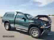 2001 Dodge Dakota Sport z VIN 1B7GG26N81S262671, wystawiony jako Copart lot #71080995 z przebiegiem 145 480 mil mil oraz Szkoda całkowita • Salvage title. Historia ofert i sprzedaży dostępna na DreamBid. Obrazek 4.