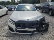 ✅ 2020 BMW 7 Series 740i xDrive • VIN: WBA7T4C0XLCD70397 • Лот: 66119165. Опубликован ранее на Copart с пробегом 50 215 миль. Бесплатный доступ к архиву аукционных продаж из США и подробный отчёт об истории автомобиля на DreamBid. Изображение 5.