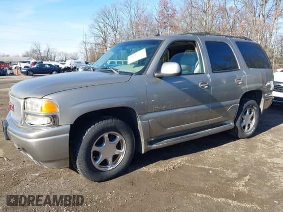✅ 2002 GMC Yukon Denali • VIN: 1GKEK63UX2J323023 • Lot: 43787393. Listed on IAAI with 184,795 mi. Free auction sales archive from the USA and detailed vehicle history report at DreamBid. Image 2.