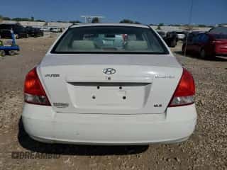 2002 Hyundai Elantra GLS z VIN KMHDN45D72U321899, wystawiony jako Copart lot #70520504 z przebiegiem 210 610 mil mil oraz Szkoda całkowita • Salvage title. Historia ofert i sprzedaży dostępna na DreamBid. Obrazek 6.