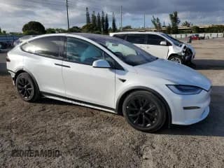 ✅ 2022 Tesla Model X • VIN: 7SAXCAE57NF357719 • Lot: 40481853. Listed on Copart with 3,799 mi. Free auction sales archive from the USA and detailed vehicle history report at DreamBid. Image 4.