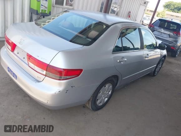 ✅ 2004 Honda Accord LX • VIN: 1HGCM55304A042445 • Lot: 42565197. Listed on IAAI with 161,445 mi. Free auction sales archive from the USA and detailed vehicle history report at DreamBid. Image 4.
