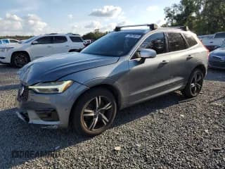 ✅ 2018 Volvo XC60 R-Design • VIN: LYVA22RM6JB083468 • Lot: 70678615. Wystawiony na Copart z przebiegiem 68 149 mil. Bezpłatny archiwum sprzedaży aukcyjnych z USA i szczegółowy raport historii pojazdu na DreamBid. Zdjęcie 1.