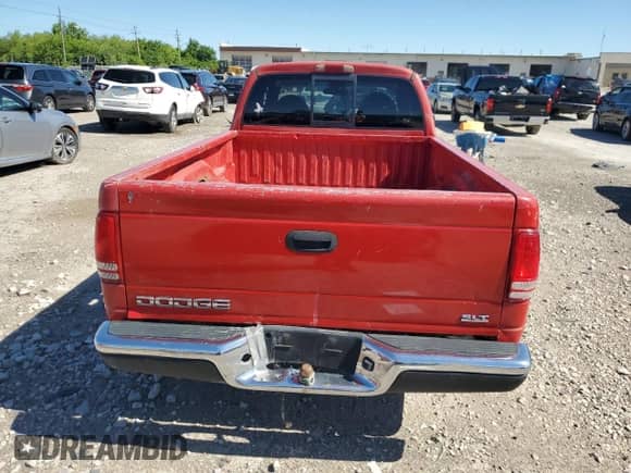 1999 Dodge Dakota SLT z VIN 1B7GL22X1XS249532, wystawiony jako Copart lot #56391484 z przebiegiem 154 117 mil mil oraz Szkoda całkowita • Salvage title. Historia ofert i sprzedaży dostępna na DreamBid. Obrazek 6.