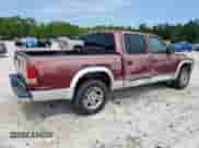 2003 Dodge Dakota SLT z VIN 1D7HL48X73S114322, wystawiony jako Copart lot #69361515 z przebiegiem 224 225 mil mil oraz Szkoda całkowita • Salvage title. Historia ofert i sprzedaży dostępna na DreamBid. Obrazek 3.