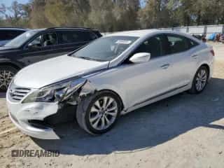 2014 Hyundai Azera с VIN KMHFG4JG1EA385784, выставлен на аукционе Copart как лот 49060695 с пробегом 168 953 миль миль и Списание • Salvage title. История ставок и продаж доступна на DreamBid. Изображение 1.